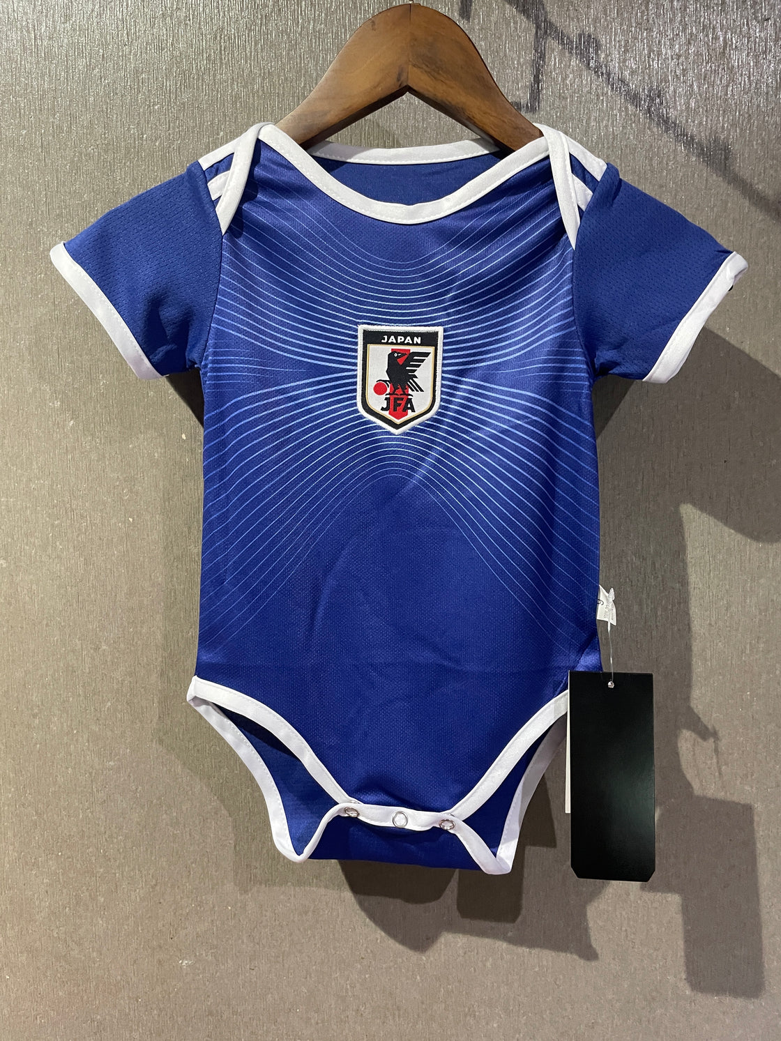 Maillot Bébé Japon Domicile 2026-2027
